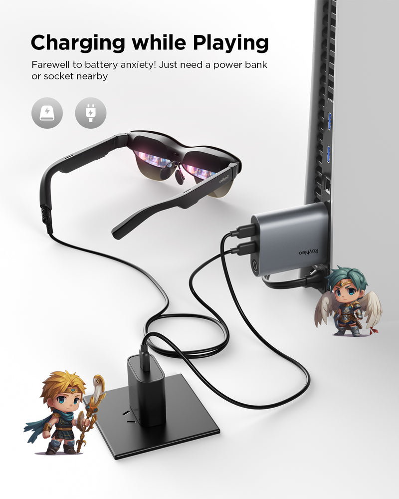 RayNeo AR glasses connected by cable to a charging adapter plugged into a laptop, showing the glasses charging while in use.